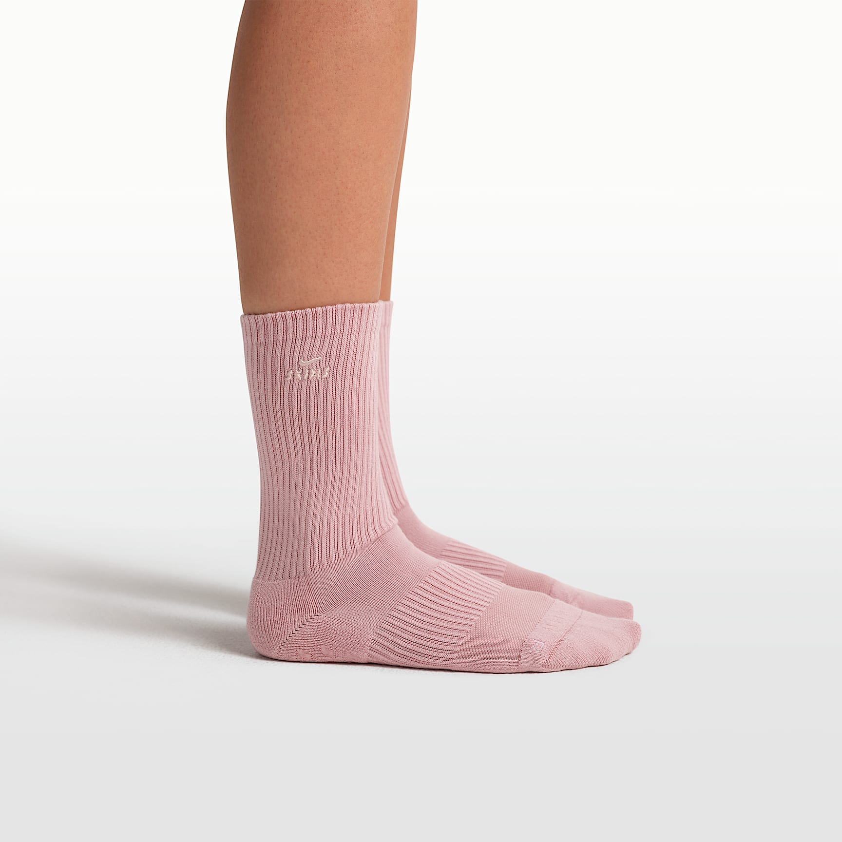 NikeSKIMS Women's Dri-FIT Pilates Grip Crew Socks (1 Pair). Nike.com